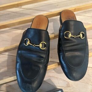 Gucci Black Leather Loafers with Gold Accents